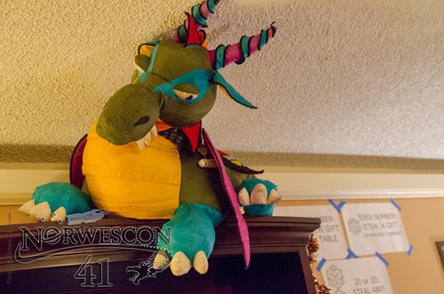 Dragon doll on a ledge